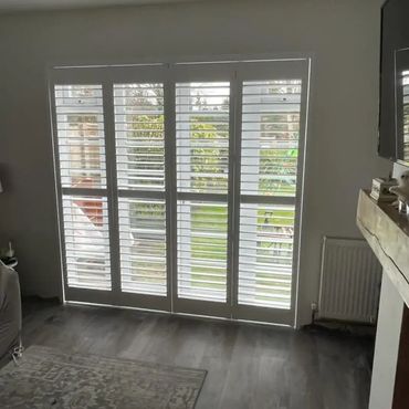 Full height bifold shutters colour white