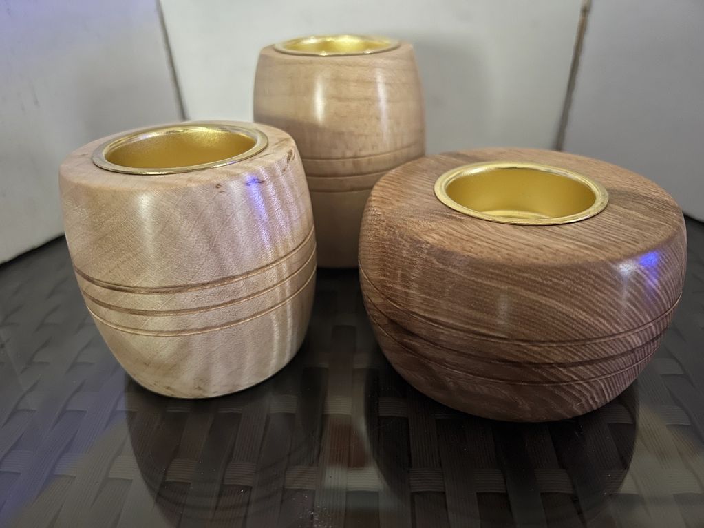 Trio of wooden tea light holders