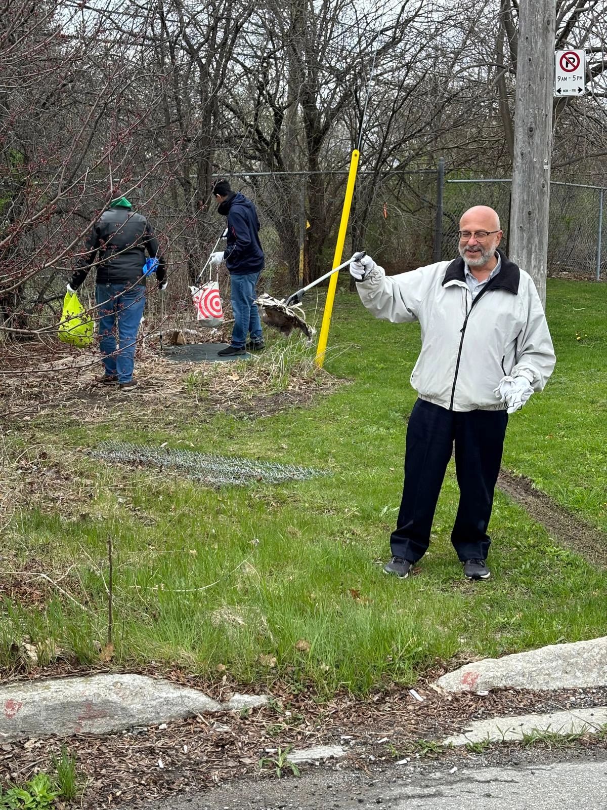 A person cleaning up trash