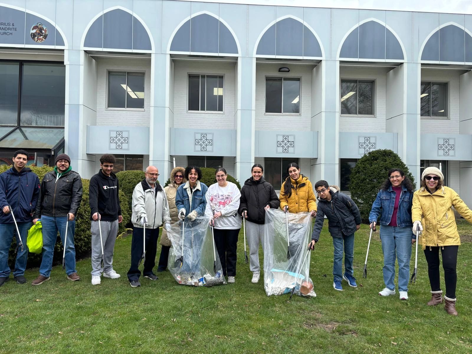 A group of people cleaning up trash