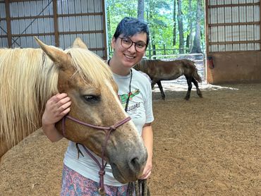Therapist posing with a horse