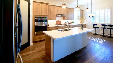 Modern kitchen interior in white and brown colors