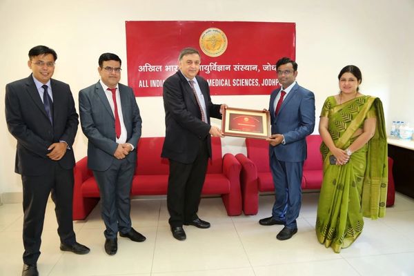 ajai sasidhar receiving recommendation from Prof. Dr. Sanjeev Misra , a renowned surgical oncologist
