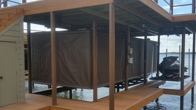 Boathouse model, Touchless Boat Cover installed under boathouse with PWC on lift 