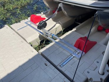 Tough HDPE parts in Red shown with Pontoon tied up next to dock on top of port