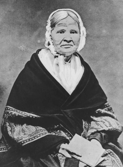 Louisa Swain, the first woman to vote.