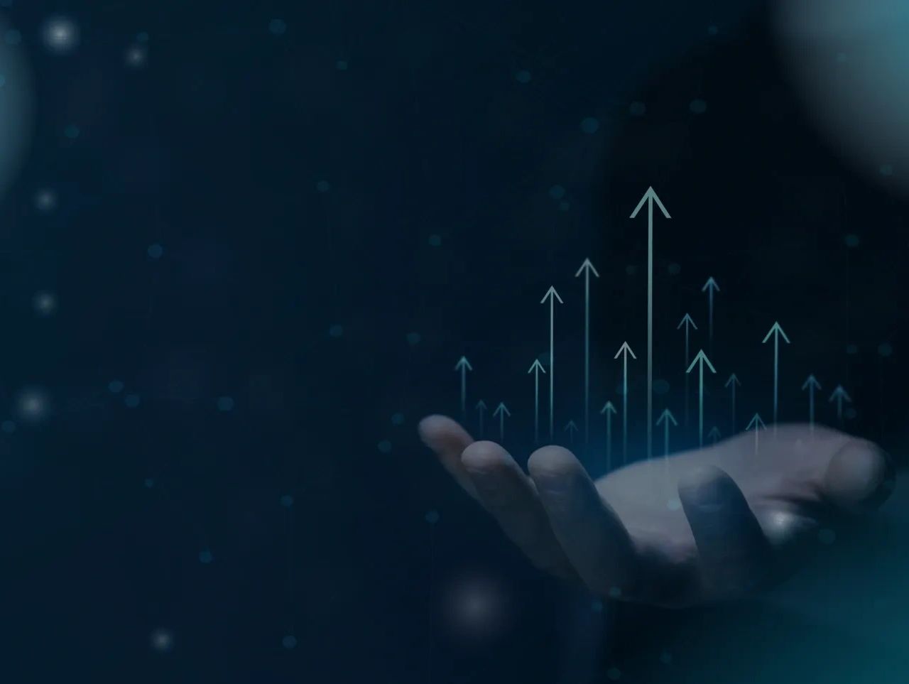 Hand with upward arrows symbolizing growth and progress.