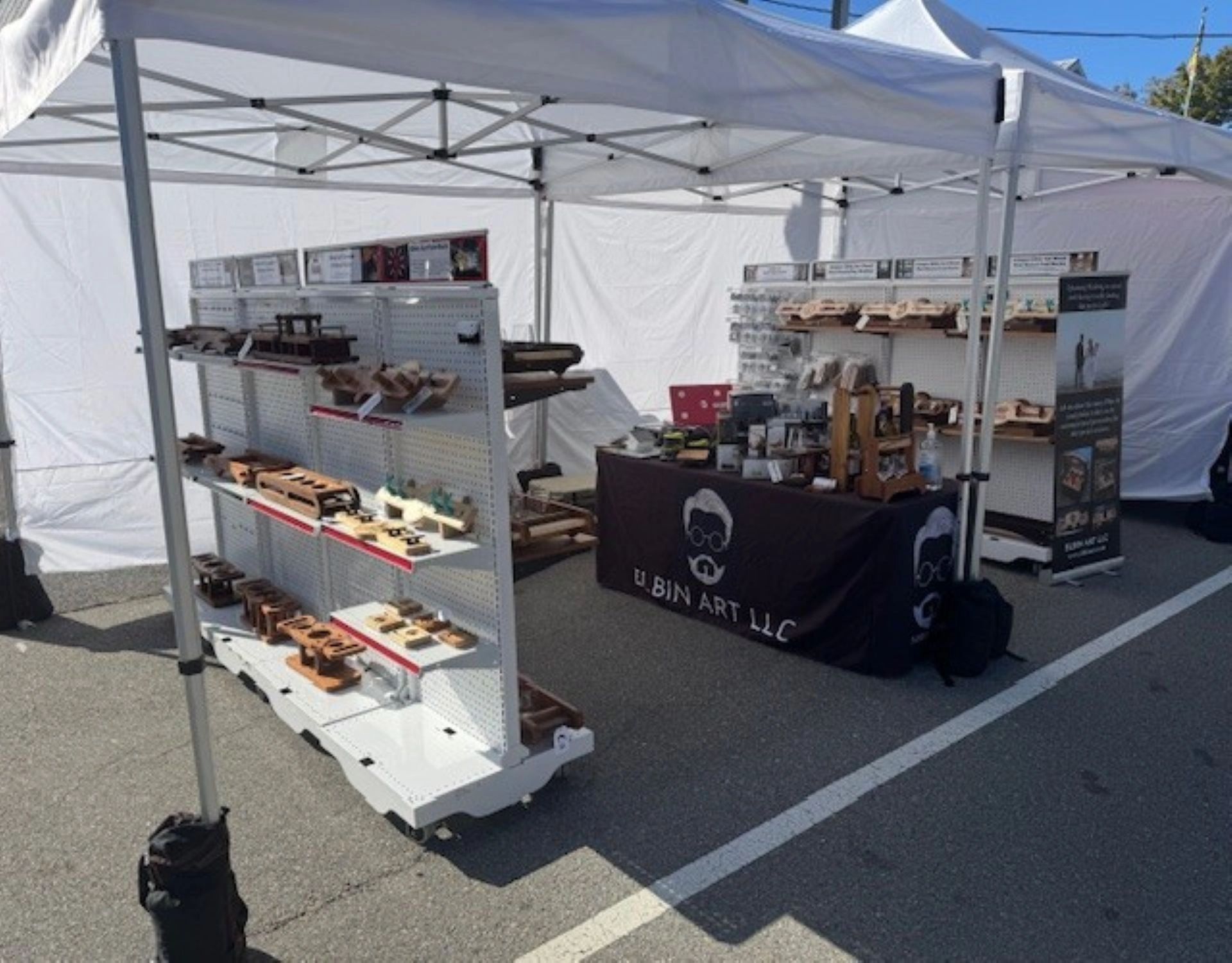 10 x 20 outdoor booth w/o back/side black hanging walls.  Corner booth,