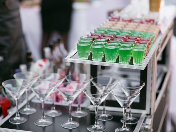 Variety of colorful green red and white beautiful alcohol sweet shooters shots cocktail