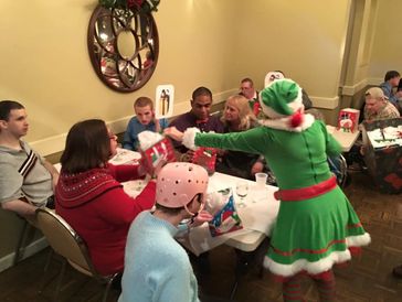 Santa's Helper greeting the 'Snow Ball' guests.