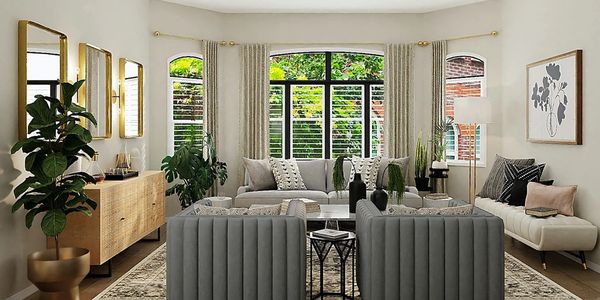 family room with fun channel accent chairs.  Bay window and custom window treatments