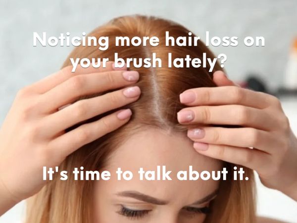 Woman combing her hair