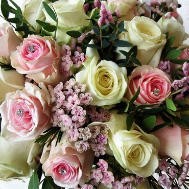 Pink and white rose handtied bridal bouquet with diamond pins