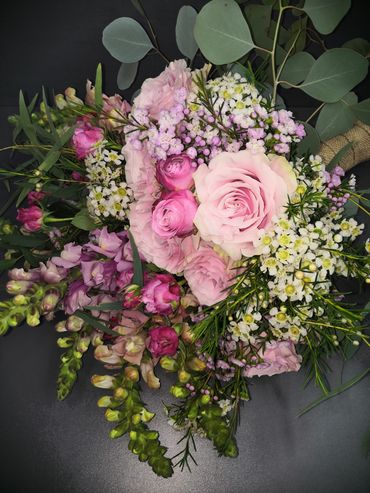 pink and white hand tied wedding bouquet by Arabella's flowers