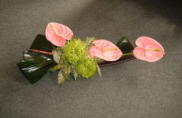 Modern pink anthurium table arrangement by Arabella's flowers