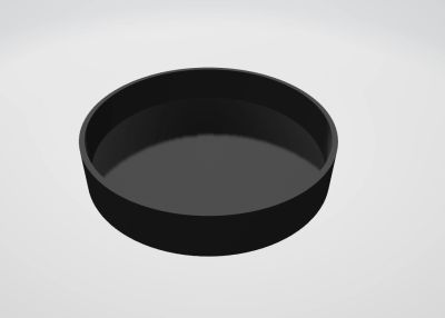 Black circular container with open top.