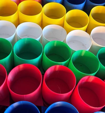 Rows of colorful plastic cylinders.