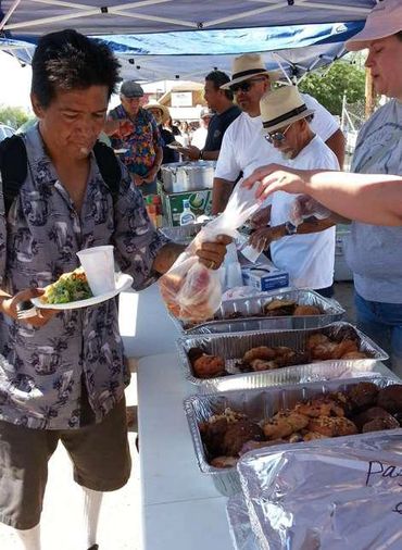 Close-up of food trays being served.