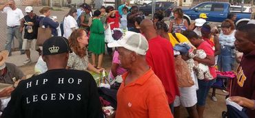 People gathered at a donation booth.