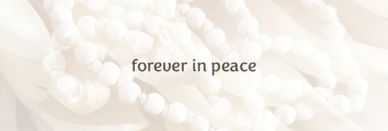 Simple memorial text over white beads background.