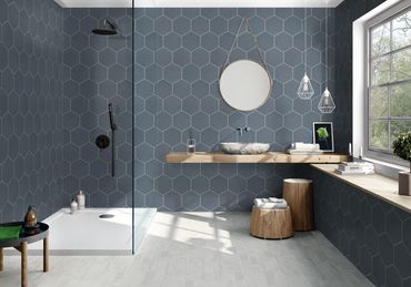 Modern bathroom and shower design with style and functionality. Hexagon tiles for timeless appeal.