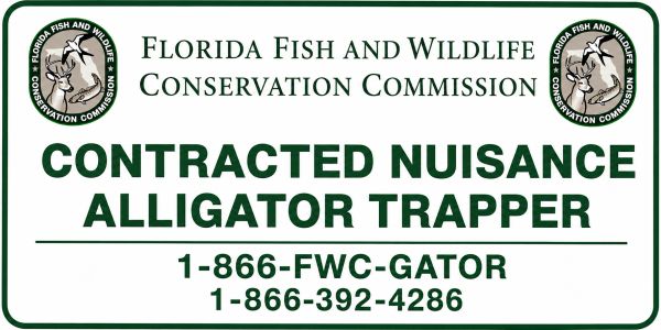 Sign for contracted nuisance alligator trapper by Florida Fish and Wildlife.