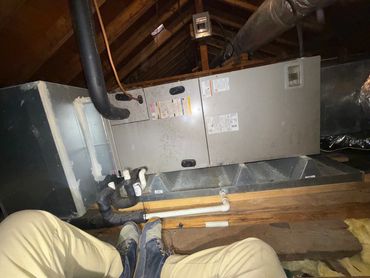 Residential attic HVAC air handler and ductwork installation by All American Mechanical