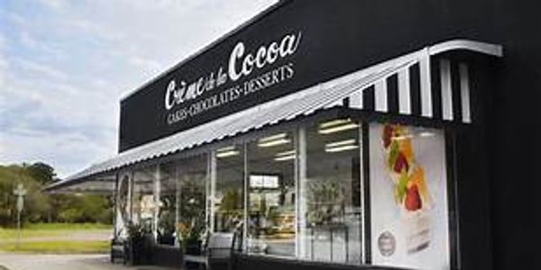 Charming black and white dessert shop named C'era una Cocoa.