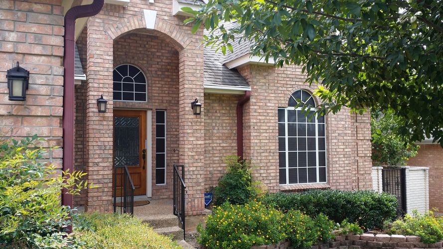 A house after receiving service from a solar screen manufacturer in San Antonio, TX