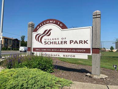 Tan and Brown Wooden Sign - Welcome to The Village of Schiller Park
Small town feel with the world a