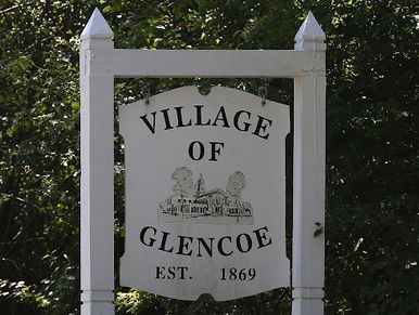 Painted white wood post sign. - Village of Glencoe 
Est. 1869