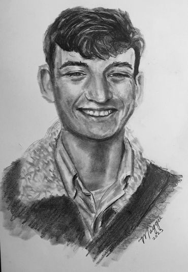 smiling young man in a jacket