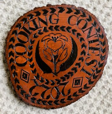 wood disk with lily and "COOKING CONTEST 2022"