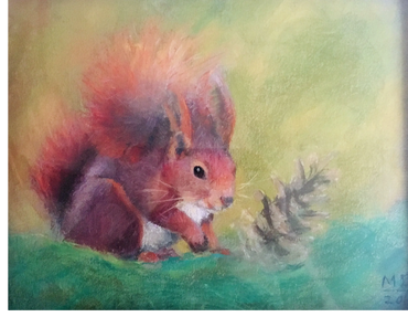 red squirrel with pinecone