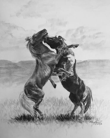two stallions fighting in a barren landscape