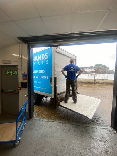 Removal van parked outside a storage unit