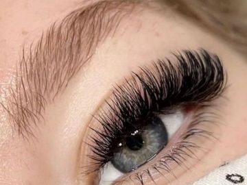 A close-up of woman thick eyelashes