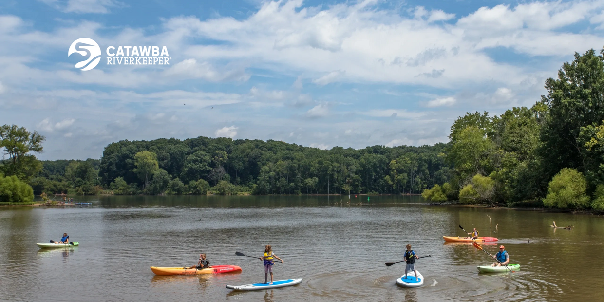 Kayakers and stand up paddleboards on Catawba River
