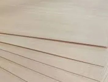 Stack of beige plywood sheets arranged in a fan shape.