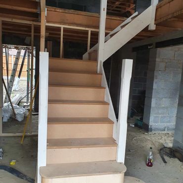 A new cart wind staircase built inside a new build property.