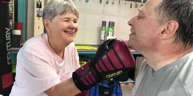 Two people boxing at SOL Fitness Parkinson’s class in Janesville, WI