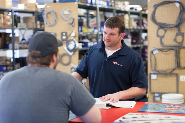 Employee helping customer at H&H Truck Parts' Store