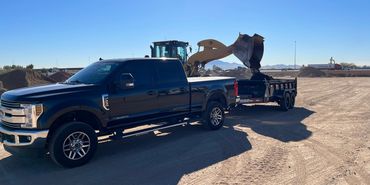 Material getting loaded on a trailer.