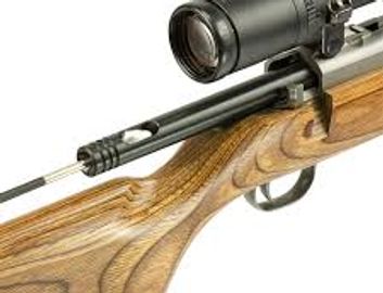 Close-up of a wooden air rifle with a mounted scope.