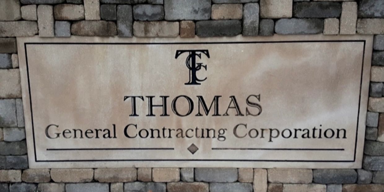 Sign for Thomas General Contracting Corporation.