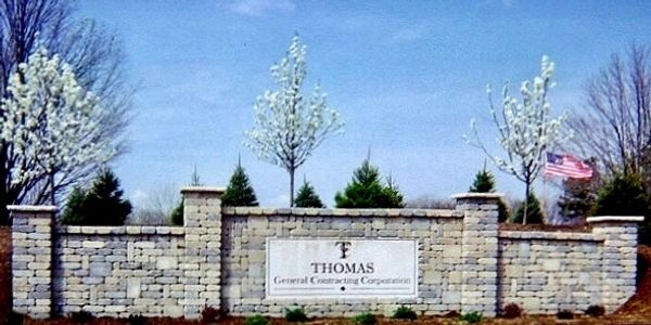 Entrance sign for Thomas General Contracting Corporation.