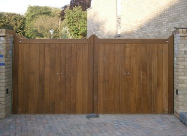 Flat Top Iroko Hardwood timber gates installed in Wirral