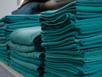 vat dyed green hospital sheets and doctor gowns