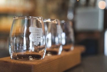 Tasting glasses on a flight board