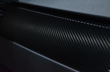 Installation of carbon fiber vinyl wrap for interior accents